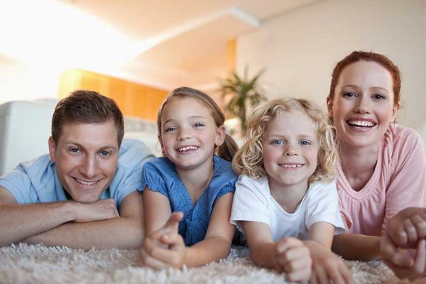 Image of a happy family after taking advantage of carpet cleaning in Provo UT